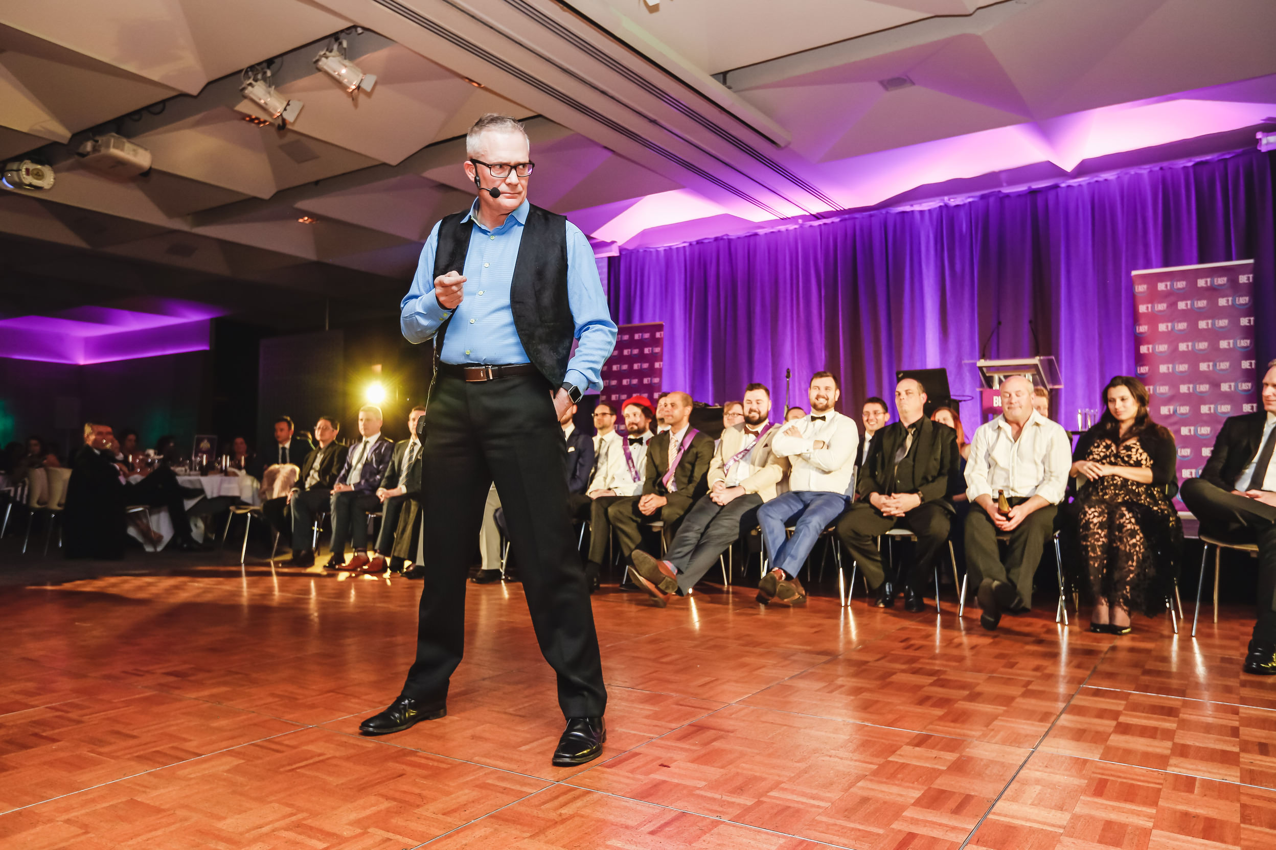 Gerard V in action at a corporate event - looking suave